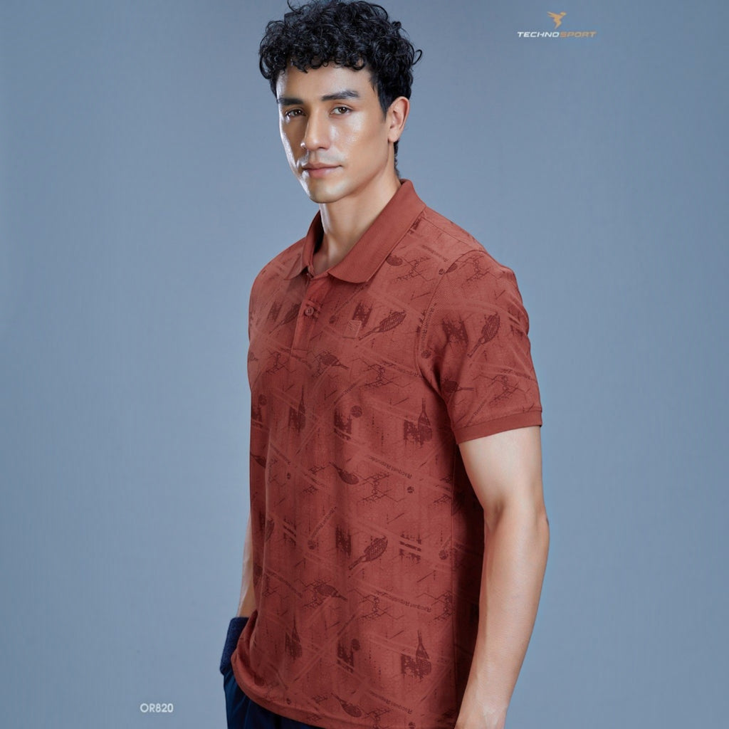 City Center TECHNOSPORTS OR820 rust-coloured performance polo shirt with a subtle geometric print on a male model
