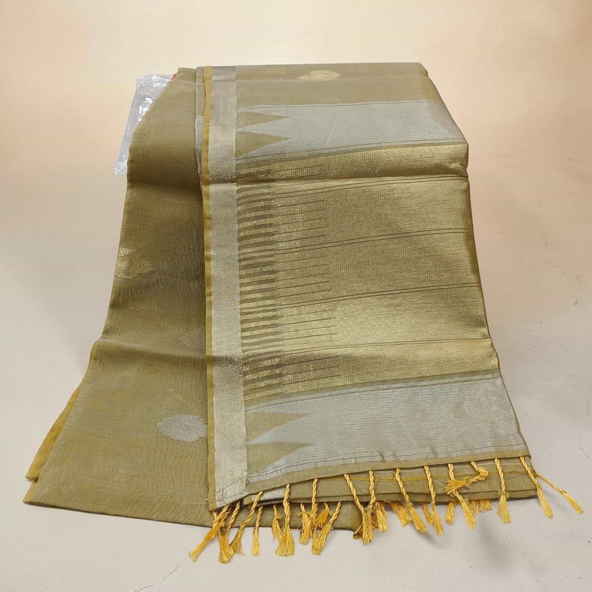 City Center tissue cotton saree in metallic gold with silver border and delicate tassel details