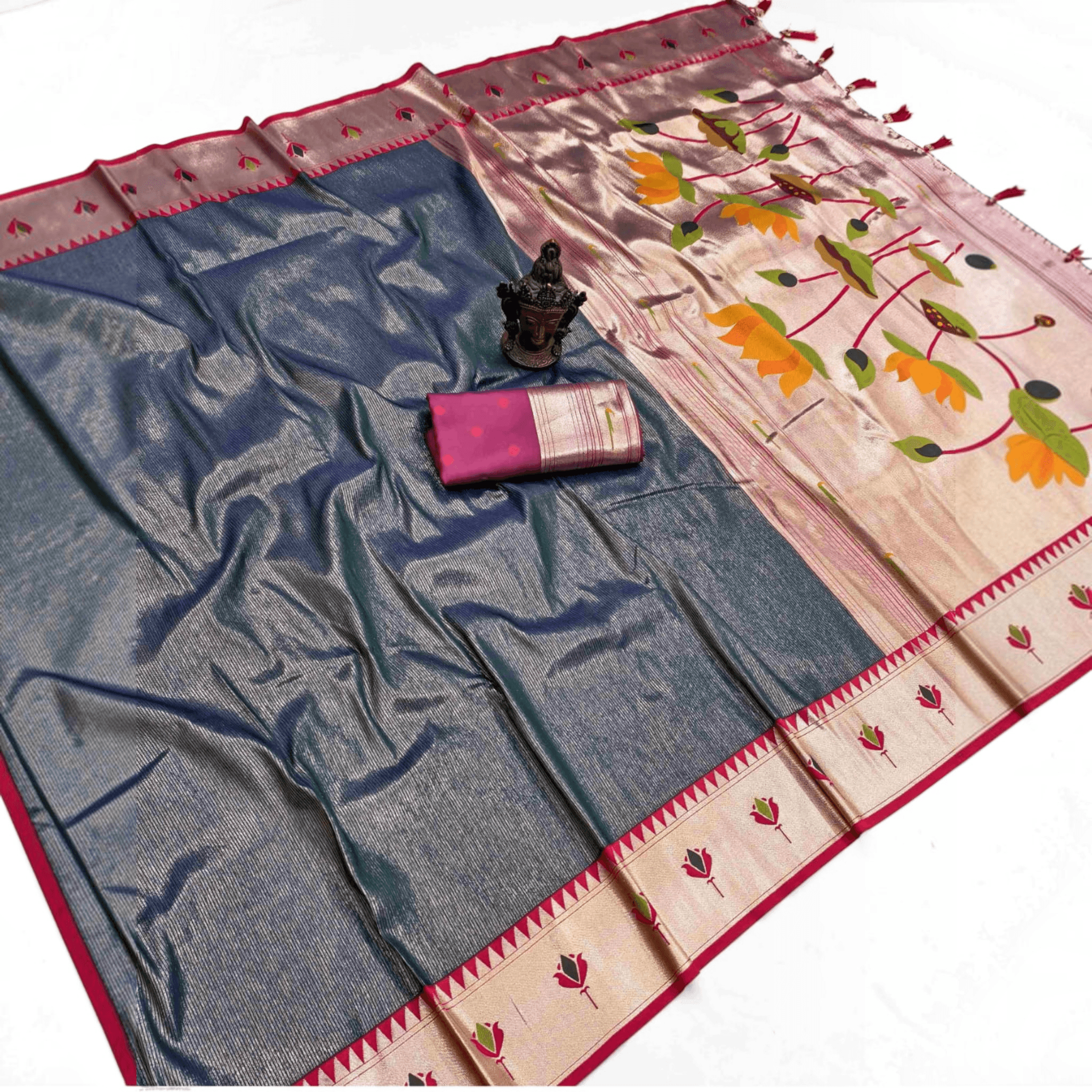 City Center Apratim tissue saree in dark blue with a metallic sheen, featuring a lotus motif Paithani pallu and blouse.
