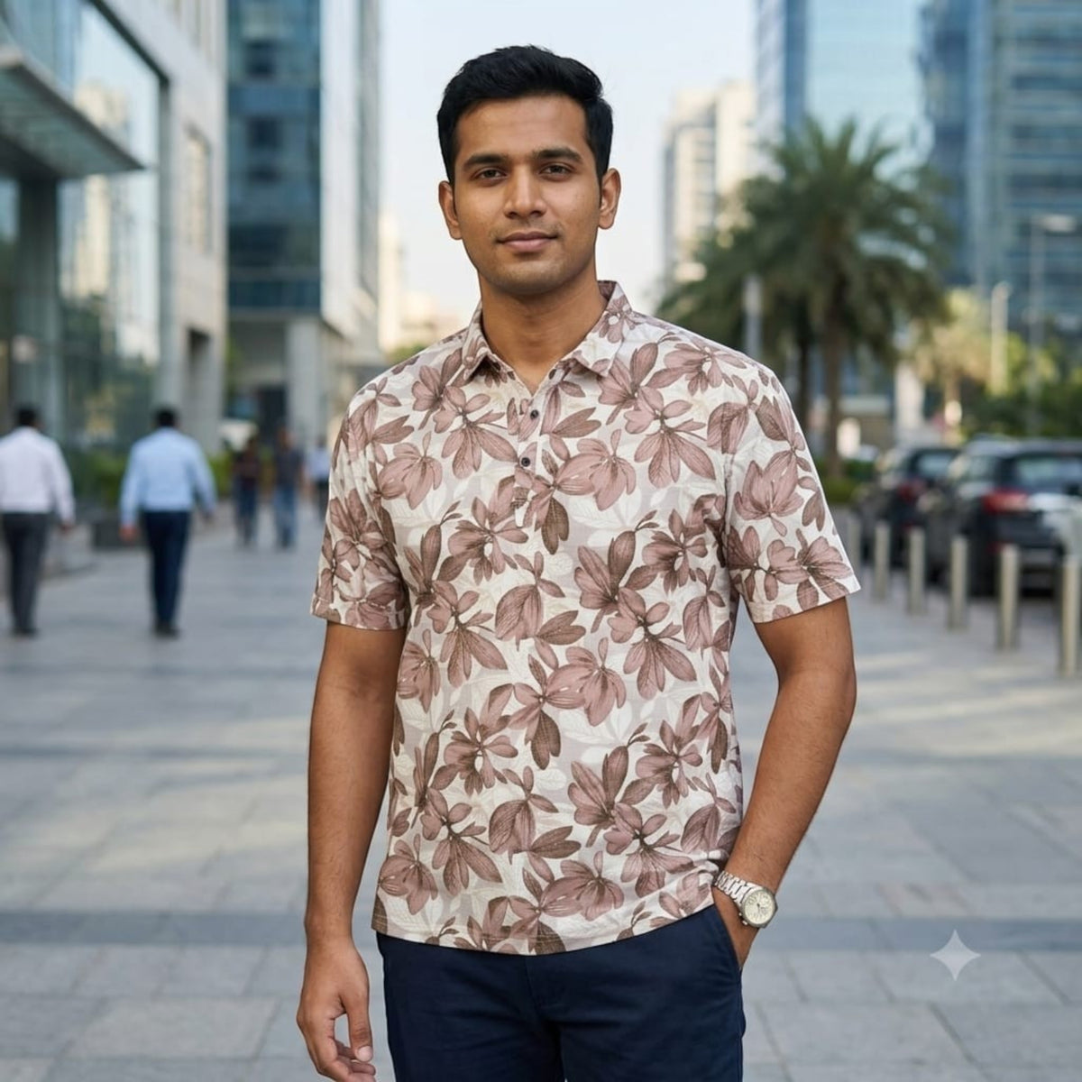 City Center TMG premium men's short-sleeve polo shirt with a brown floral print, worn by a man in an urban setting.