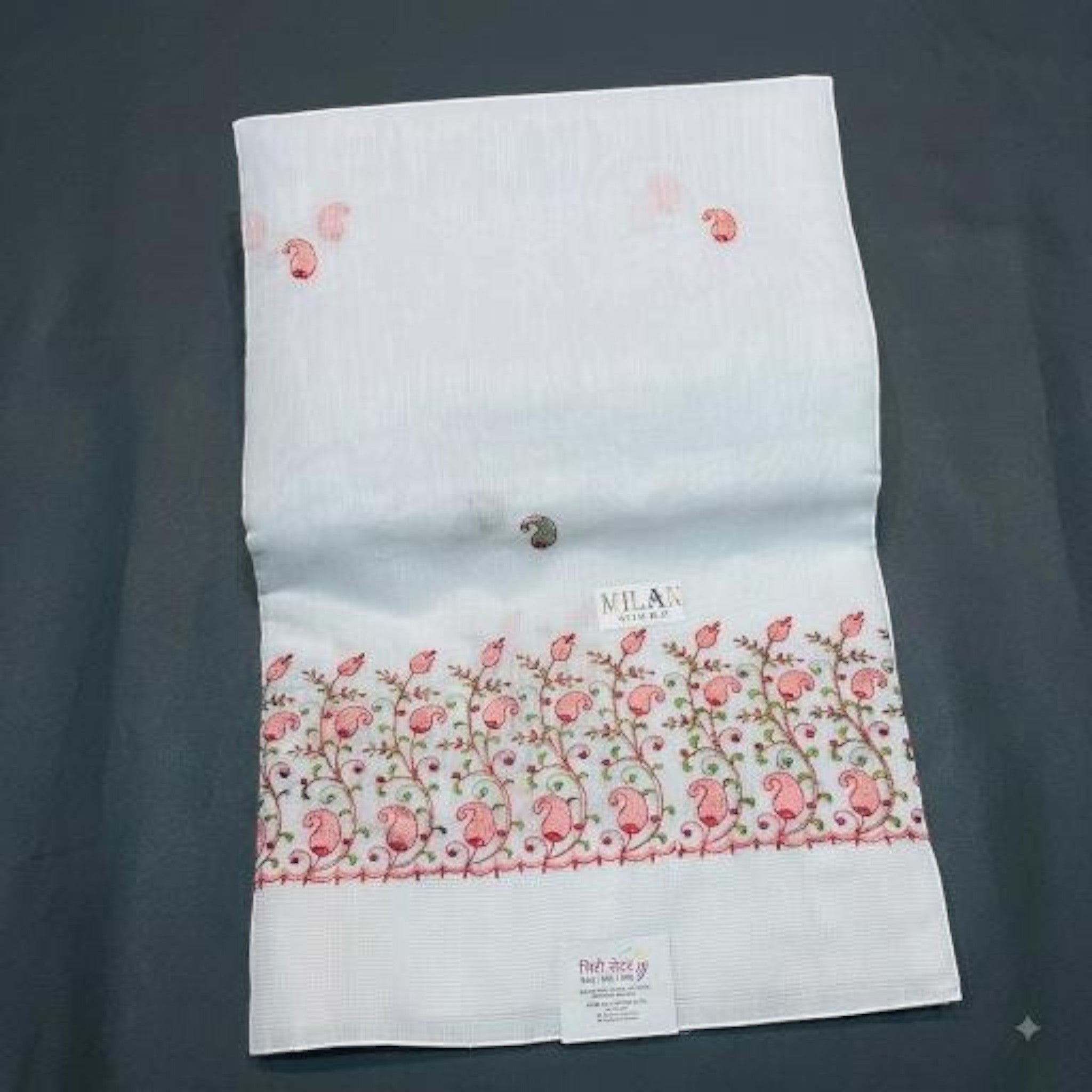 City Center white saree featuring delicate pink floral embroidery and paisley motifs on a lightweight fabric base