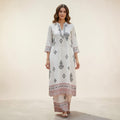 City Center premium 2-piece co-ord set featuring a white kurta with black geometric print and matching wide-leg pants