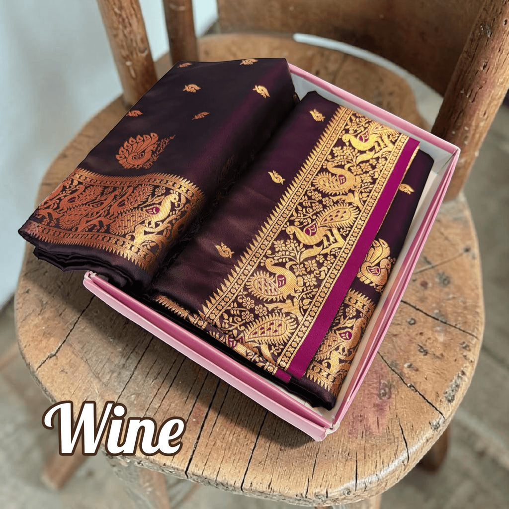 City Center wine handwoven Peshwai Paithani silk saree with intricate gold zari peacock motifs in a gift box