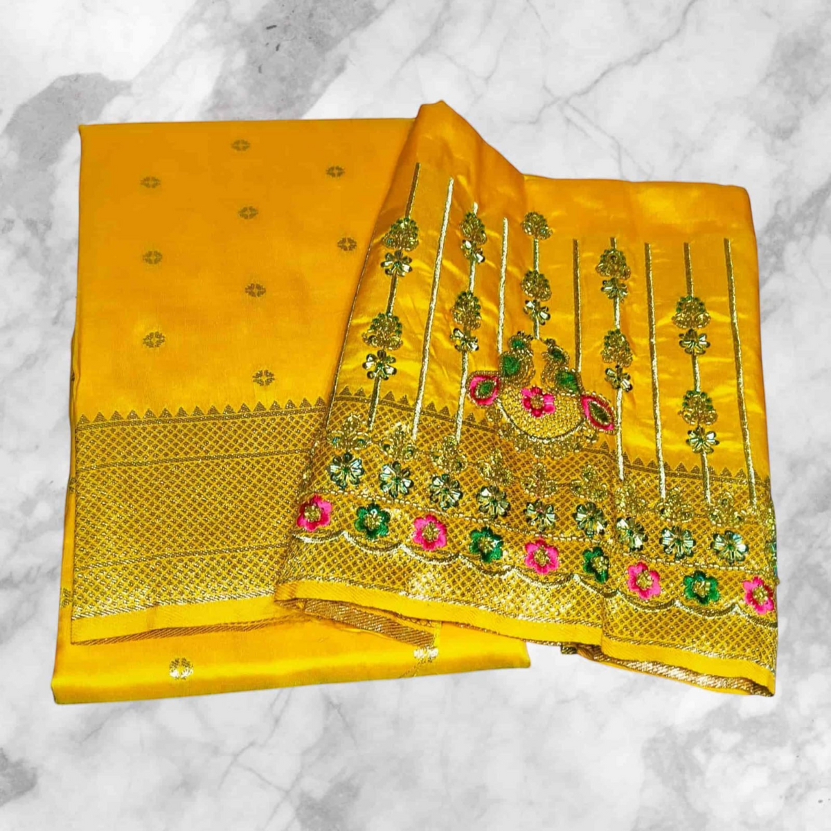 City Center yellow saree with intricate Aari work blouse featuring floral embroidery and gold zari border details