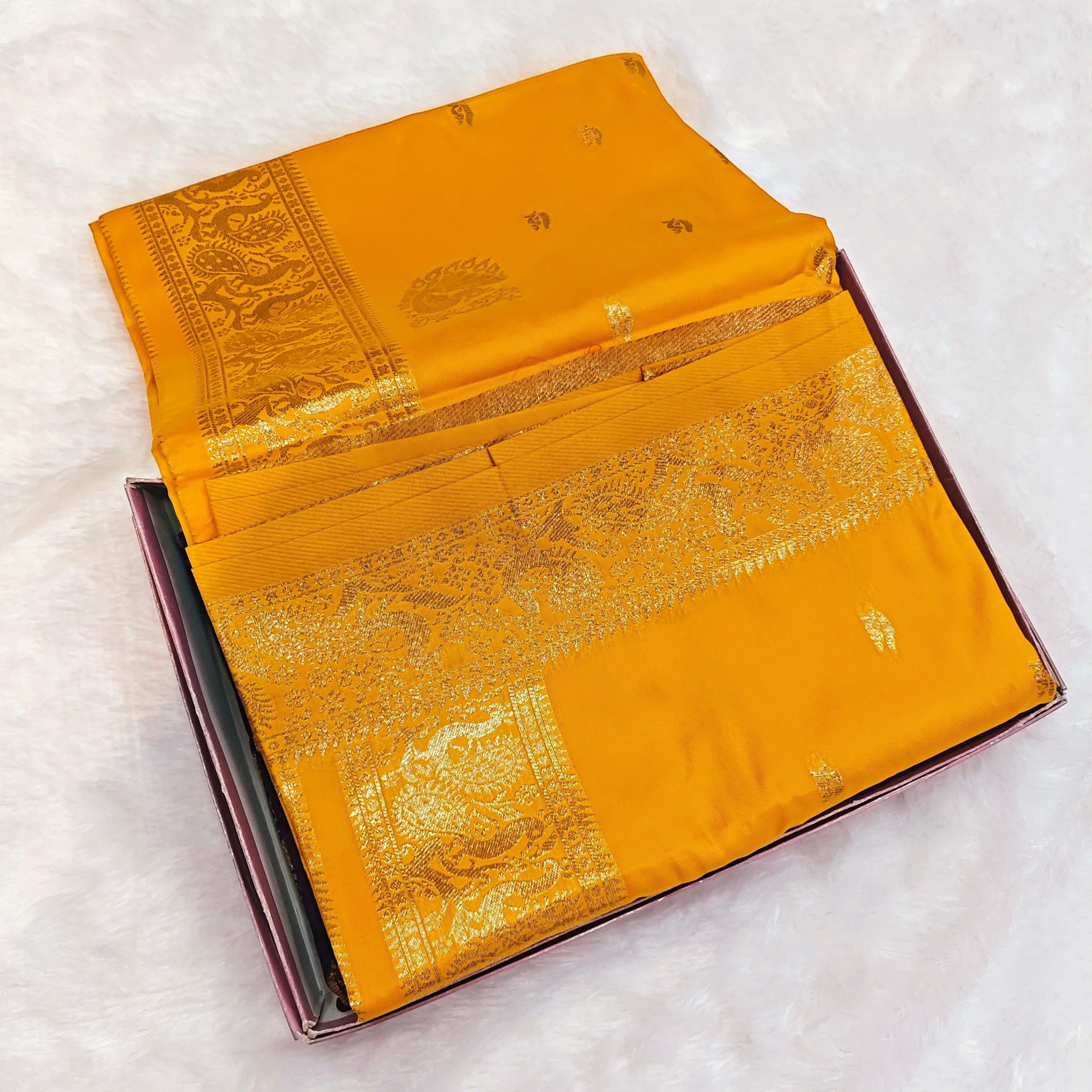City Center premium yellow Peshwai silk saree with intricate gold zari border and traditional motifs in a gift box