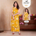 City Center Avni Collection yellow sleeveless rayon co-ord set with white geometric nodes pattern and tassel details