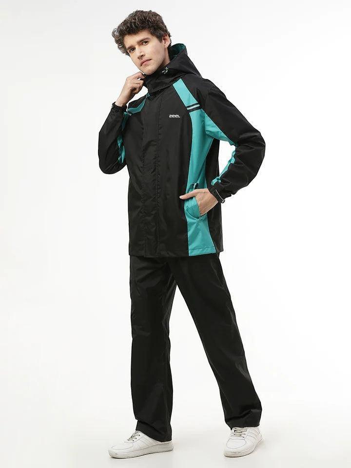 City Center Zeel Go Hike black and blue waterproof rainsuit with hood, worn by a man for outdoor monsoon protection.