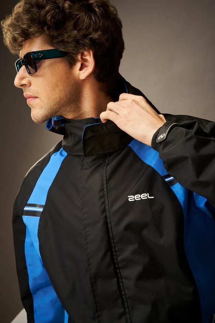 City Center Zeel Go Hike black and blue waterproof rain jacket with helmet-compatible hood and adjustable cuffs