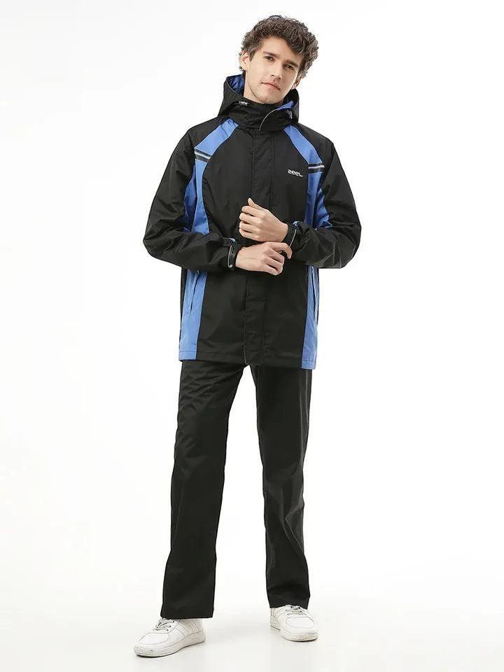 City Center Zeel Go Hike black and blue waterproof rainsuit with hood and taped seams worn by a male model
