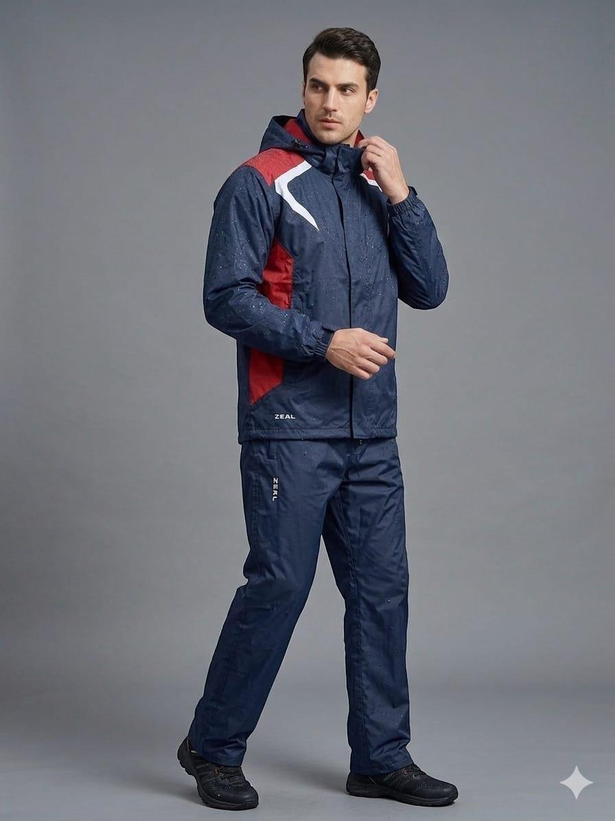 City Center ZEEL premium men's waterproof rainsuit in blue with green accents, featuring a high-neck and storm flap.