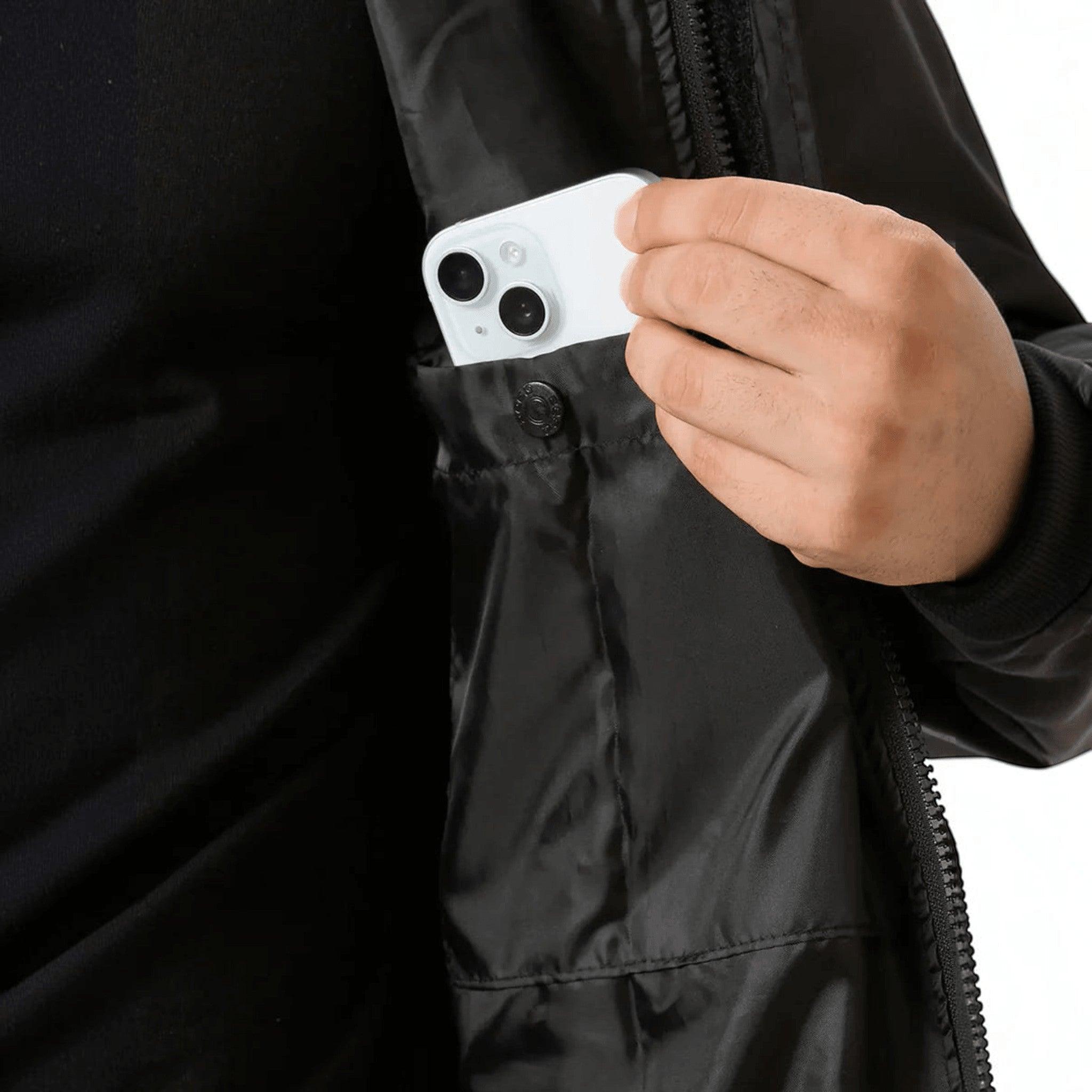 City Center ZEEL premium black waterproof rain jacket featuring a secure internal pocket for smartphone storage