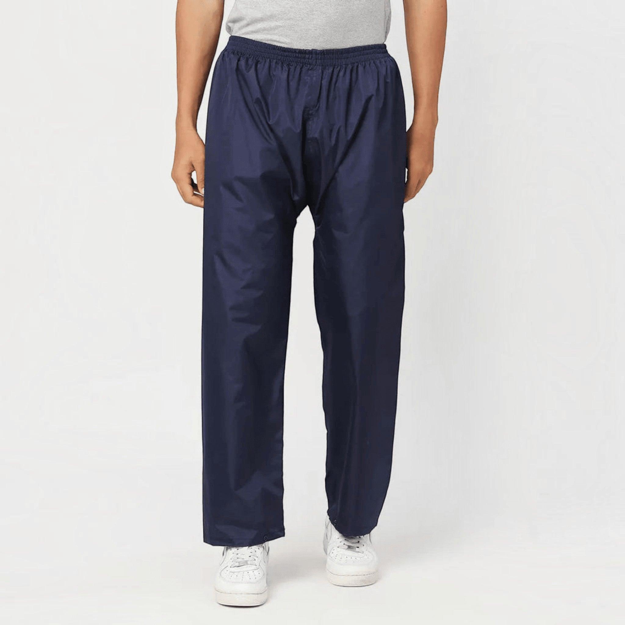 City Center Zeel ZE101 navy blue waterproof rain pants made of durable PVC-coated polyester with an elastic waistband.