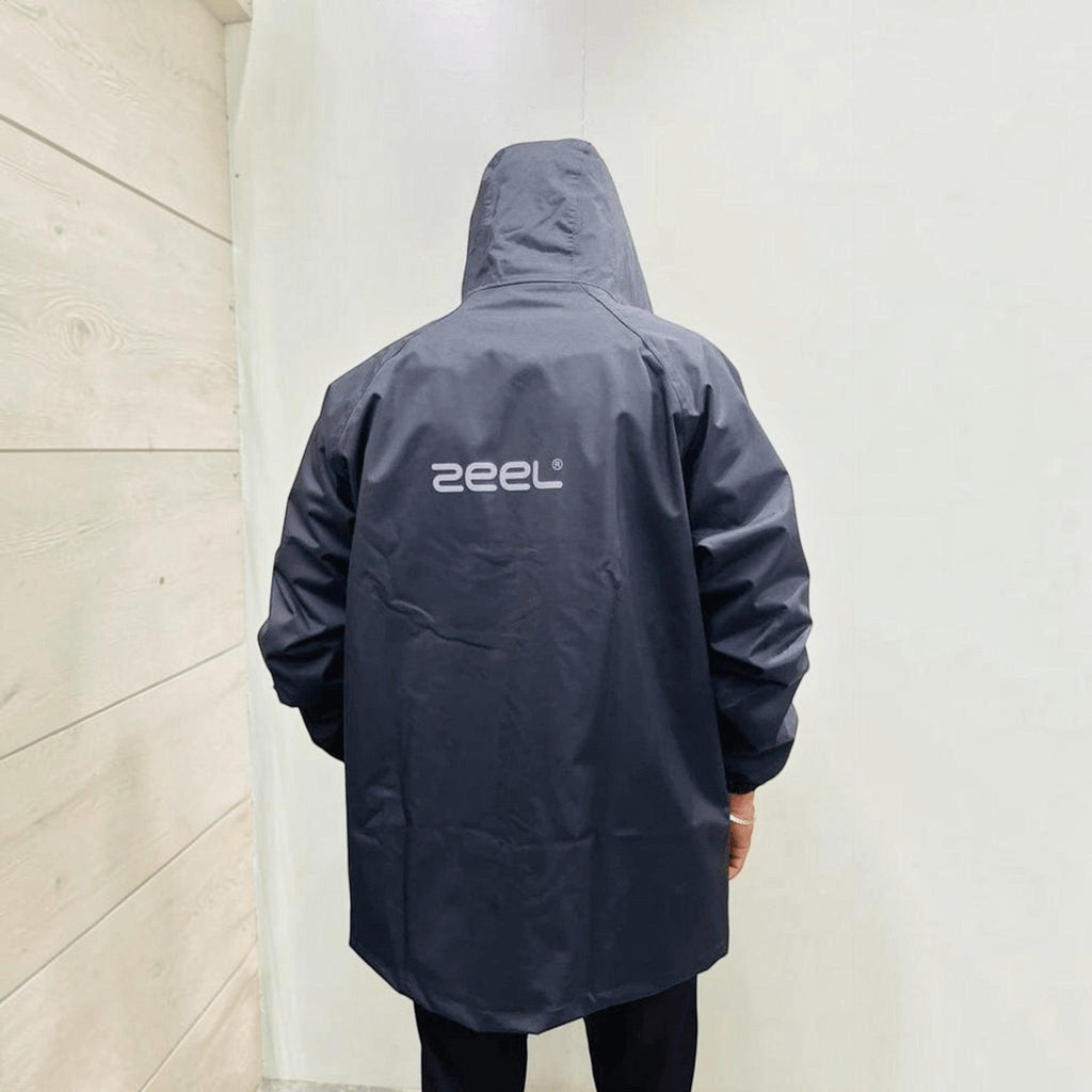 City Center Zeel ZE101 dark grey waterproof PVC-coated polyester raincoat with hood, viewed from the back.